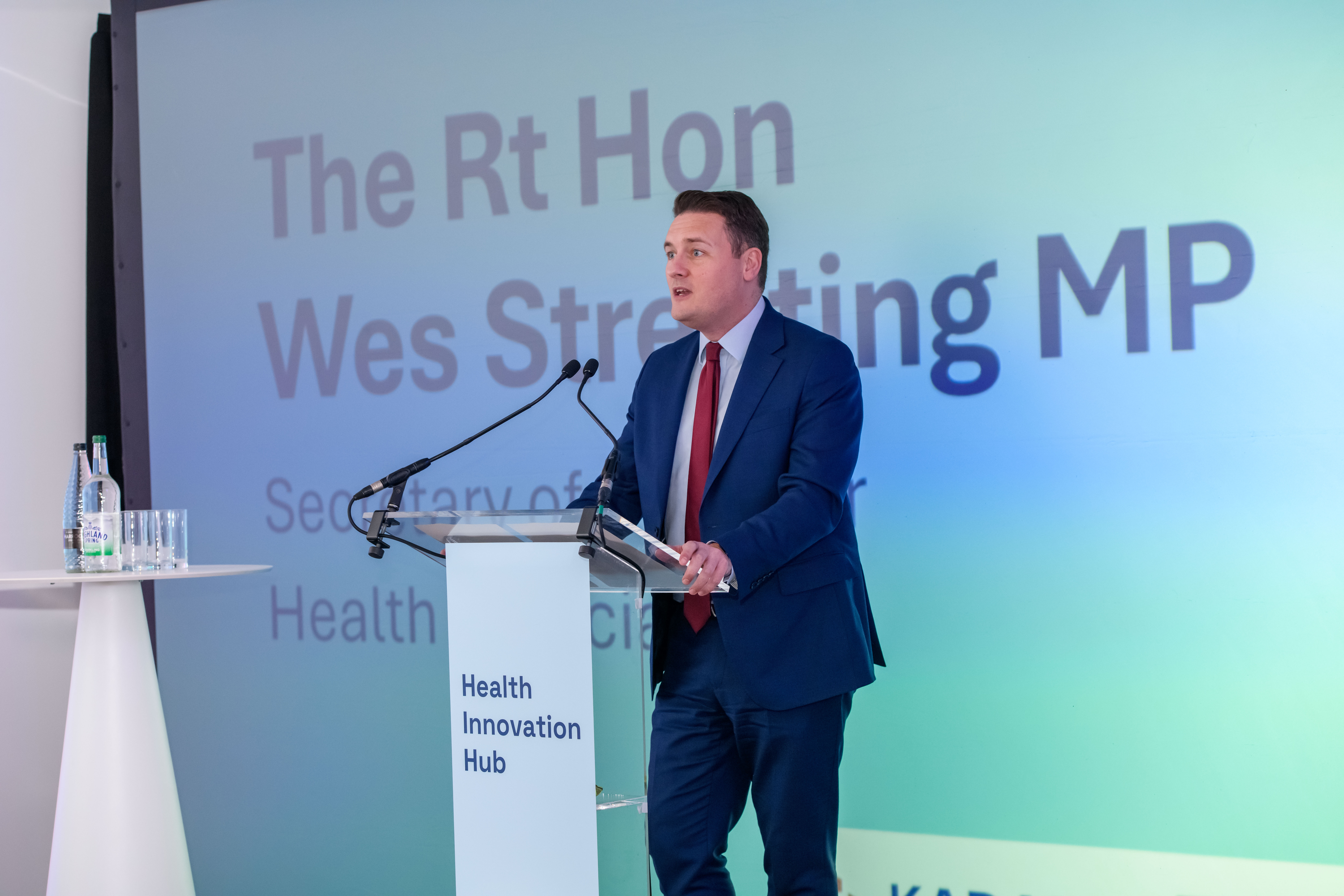 Men giving a presentation at the Health Innovation Hub